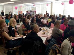 Attendees listen to the findings of the study at last week’s Beyond October event at the Chicago Urban League.